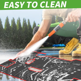 10L0L easy-clean golf cart floor mat being rinsed after use
