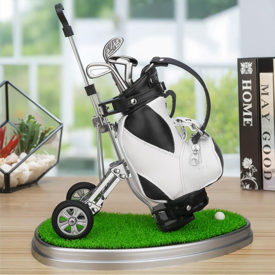 10L0L golf pen holder on desk with a scaled green scene.