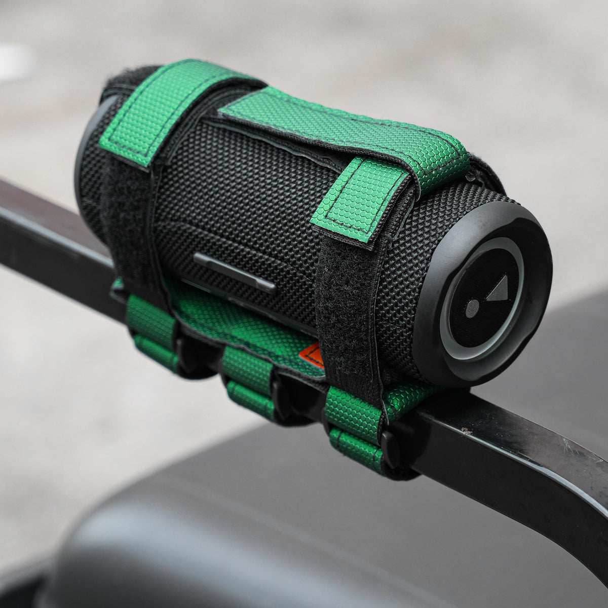 10L0L strap system holding a water bottle and umbrella for all-day rides.