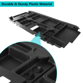 Close-up of the durable plastic material used in the under-seat tray.