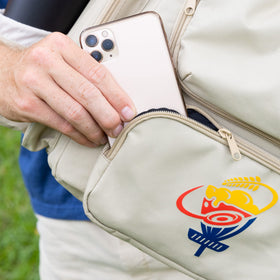 Pockets designed for a fold-up stool or umbrella for versatility