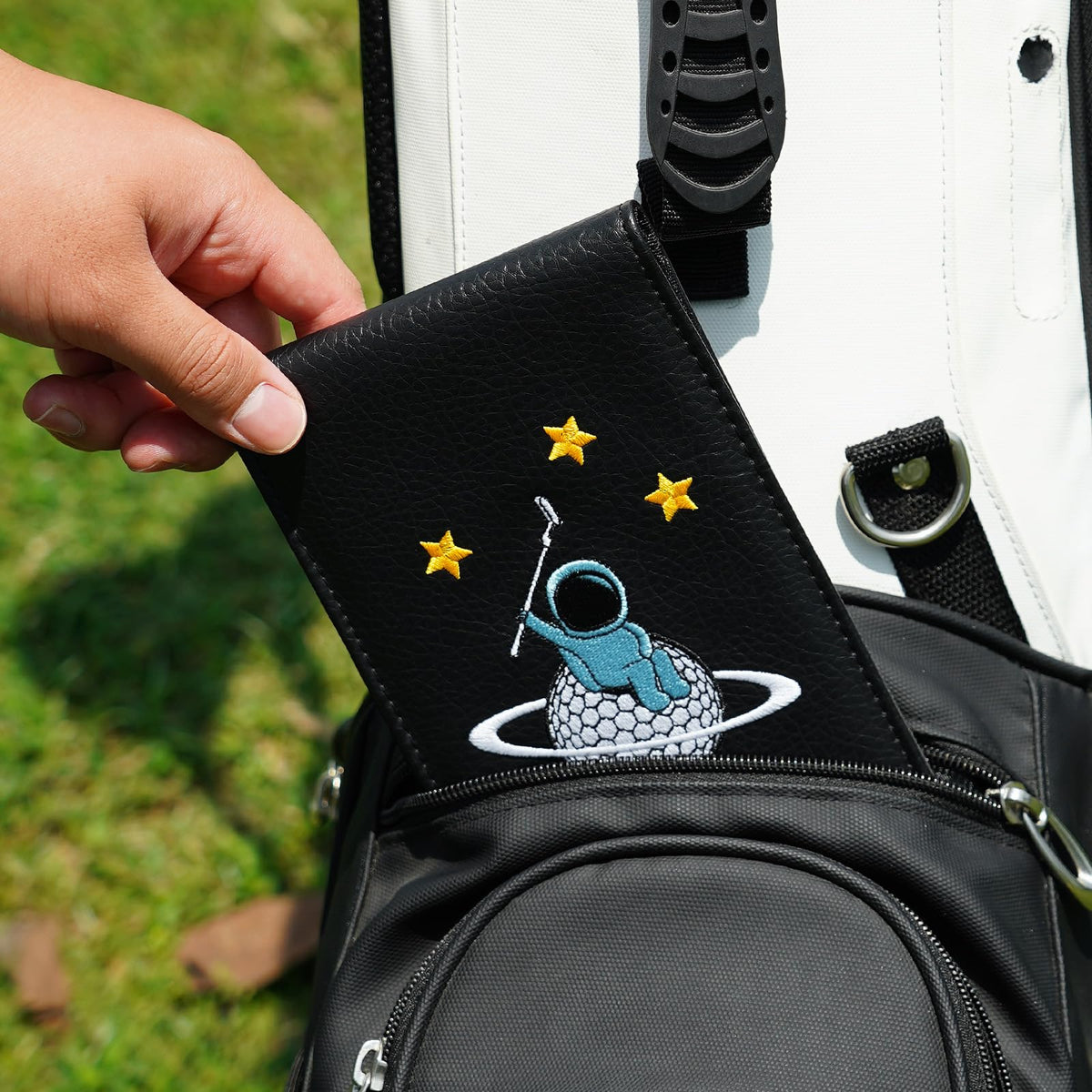 Two scorecard slots to fit large or small cards