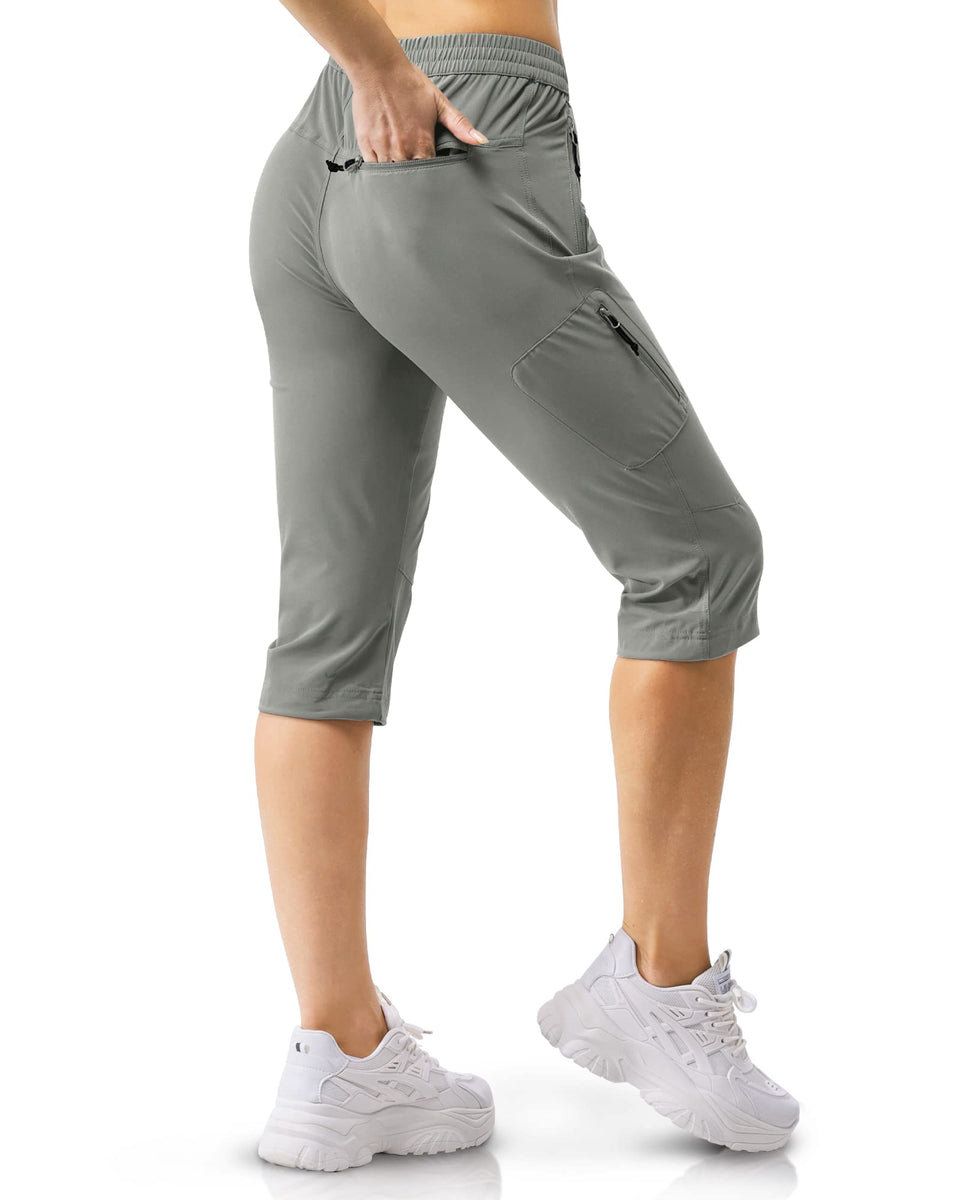 33000ft women's Capri golf pants front view, slim fit with quick-dry fabric for active days.