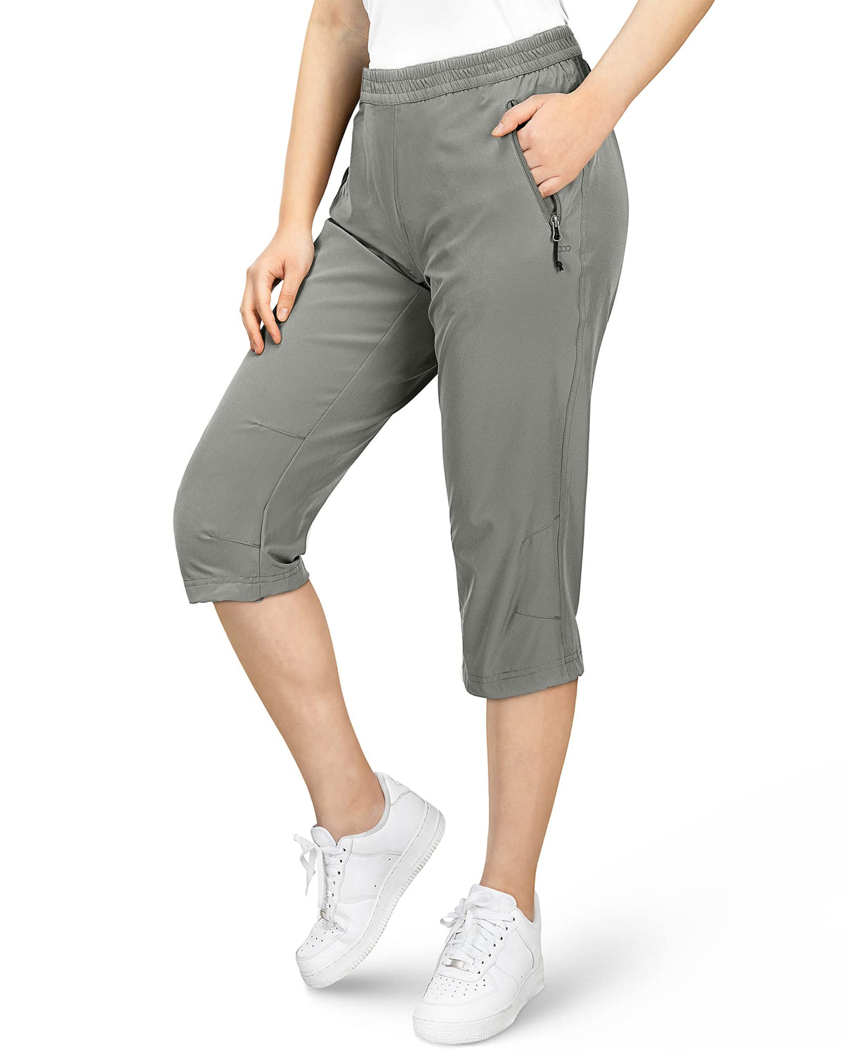 33000ft women's Capri golf pants side pocket, secure zipper for on-the-go storage.