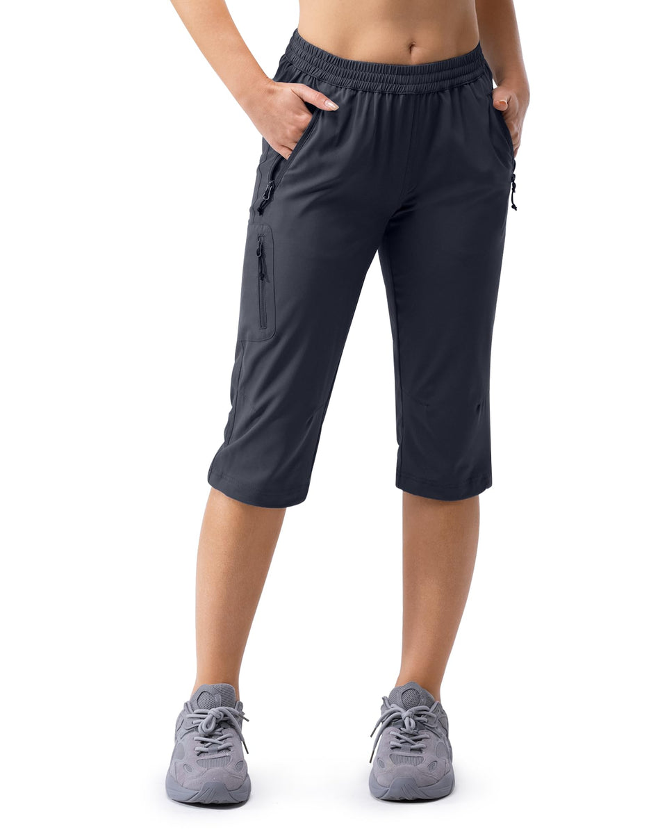 33,000ft women's golf capri pants with pockets; secure zipper pockets for essentials.