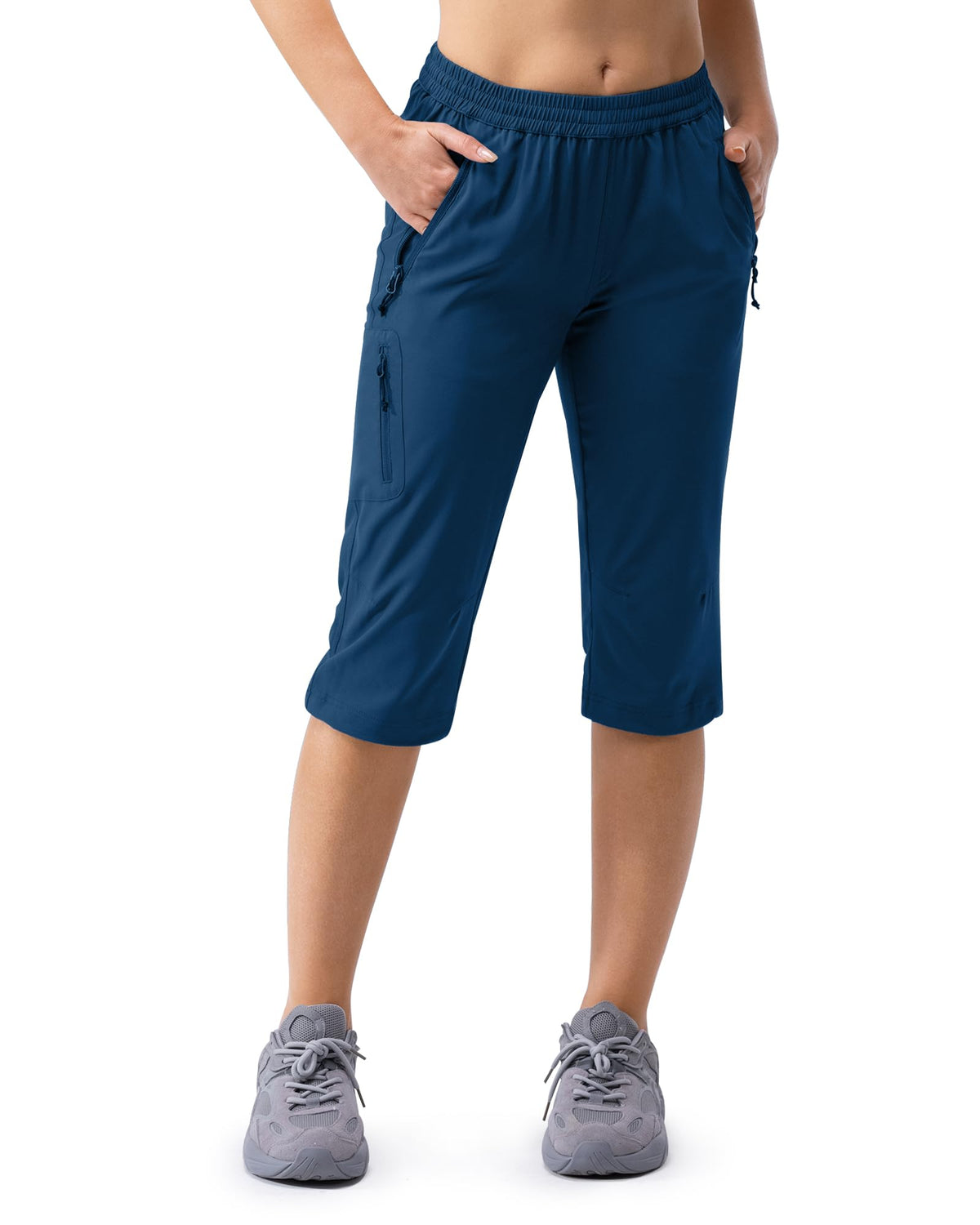 33000ft women's golf capri pants with pockets for secure storage during outdoor activities.