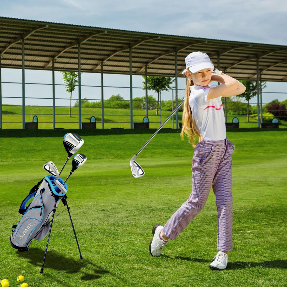 Young golfer with Finchley set during practice on the range