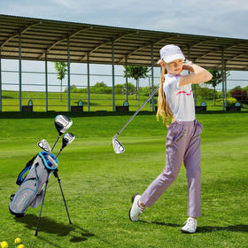 Young golfer with Finchley set during practice on the range
