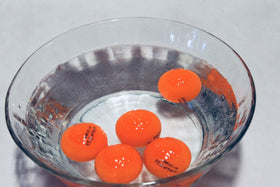 A99 Golf Floater ball close-up showing 432 dimples for authentic feel.
