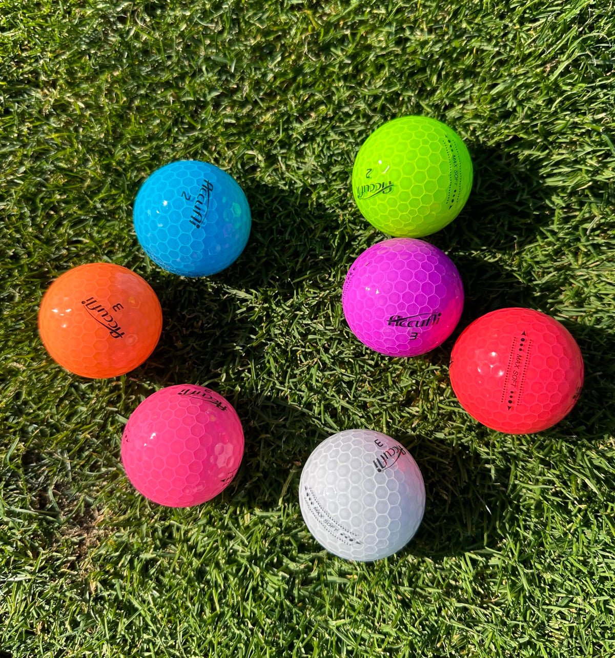 ACCUFLI Max Soft Crystal Red with aero dimples promoting stable flight and distance
