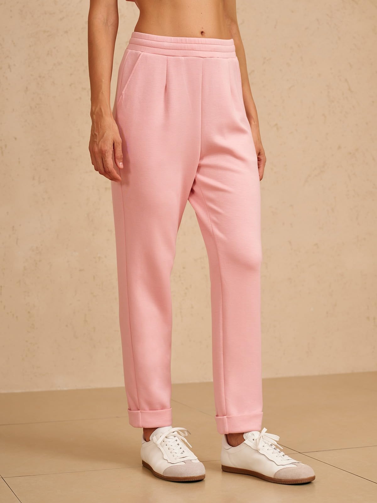ACEGOLFS women's golf pants side view pink, sleek tapered fit for flattering silhouette.