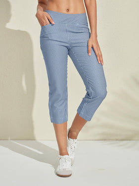 ACEGOLFS women's plaid golf pants showing stretch for easy mobility on the course