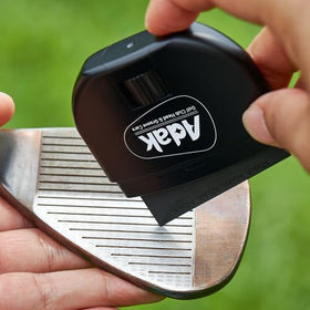 ADAK diamond-infused elastomer cleans and polishes clubface grooves.