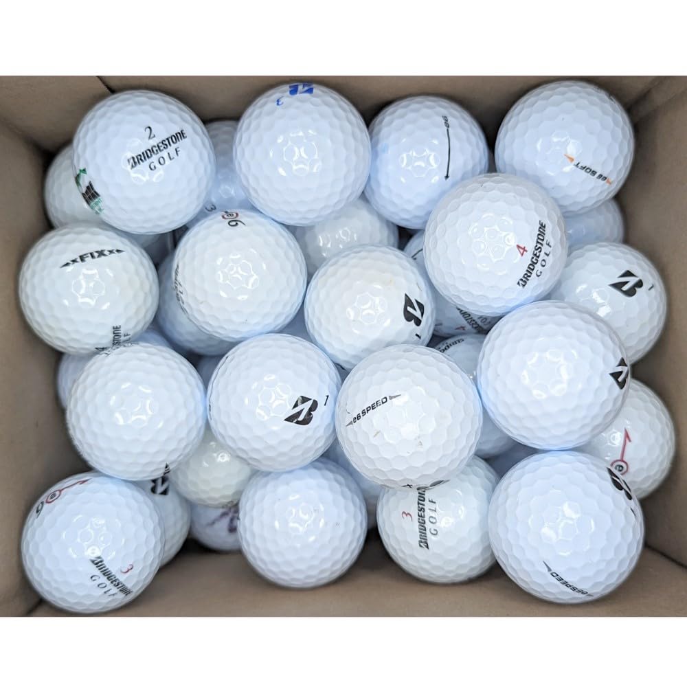 Afford-A-Ball Golf balls on green illustrate affordable practice options.