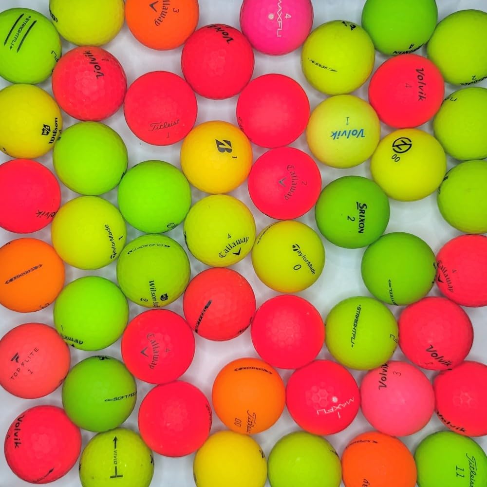Afford-A-Ball Golf matte color balls on green for high visibility shots.