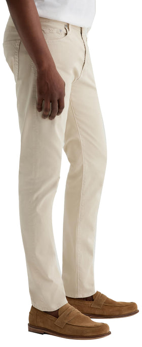Knee area of AG Tellis Modern Slim pant demonstrating flexibility and movement