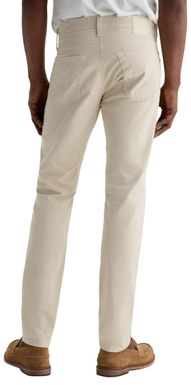 Lifestyle view of AG Tellis Modern Slim pant for versatile everyday wear