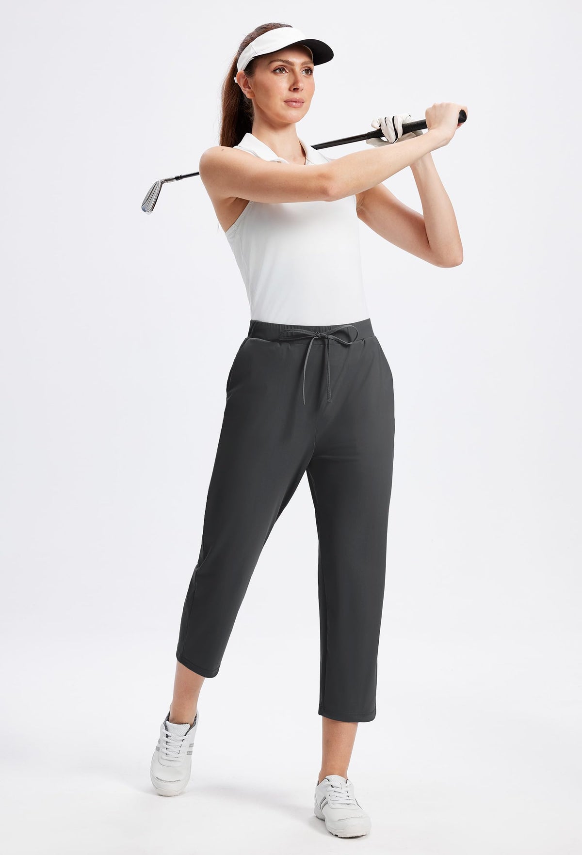 Alaroo Rexley pants on model pair with heels or sneakers for work or travel.
