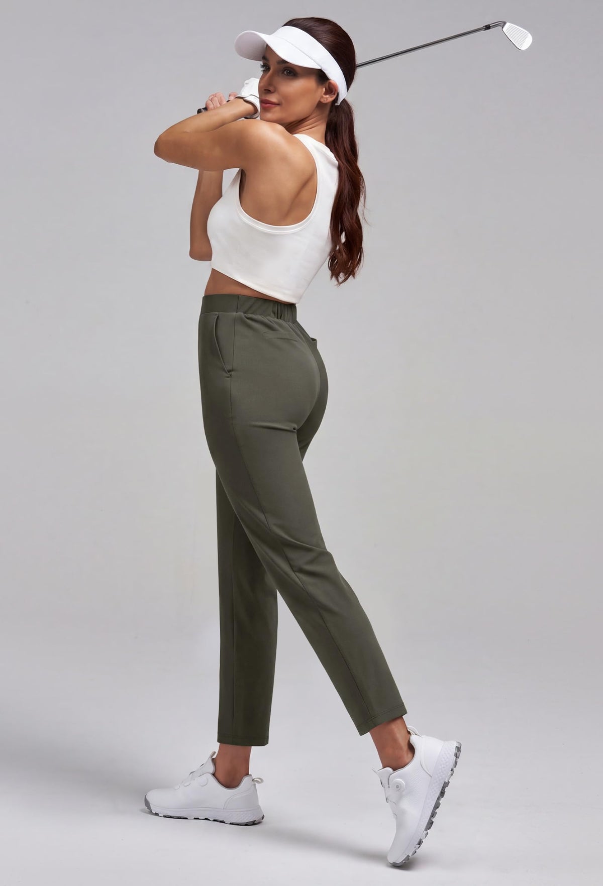 Alaroo golf pants cropped ankle fit to elongate the legs.