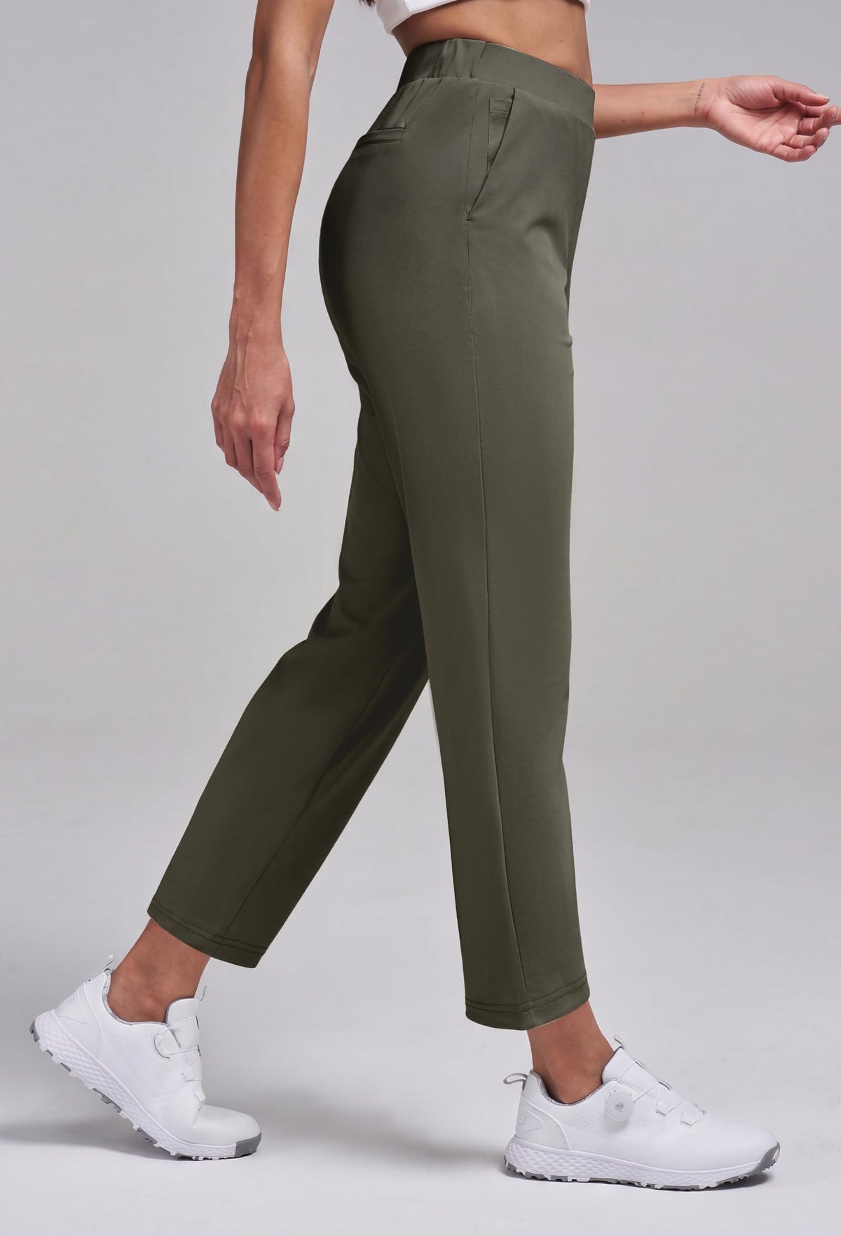 Alaroo golf pants high‑rise waist offering gentle tummy support.
