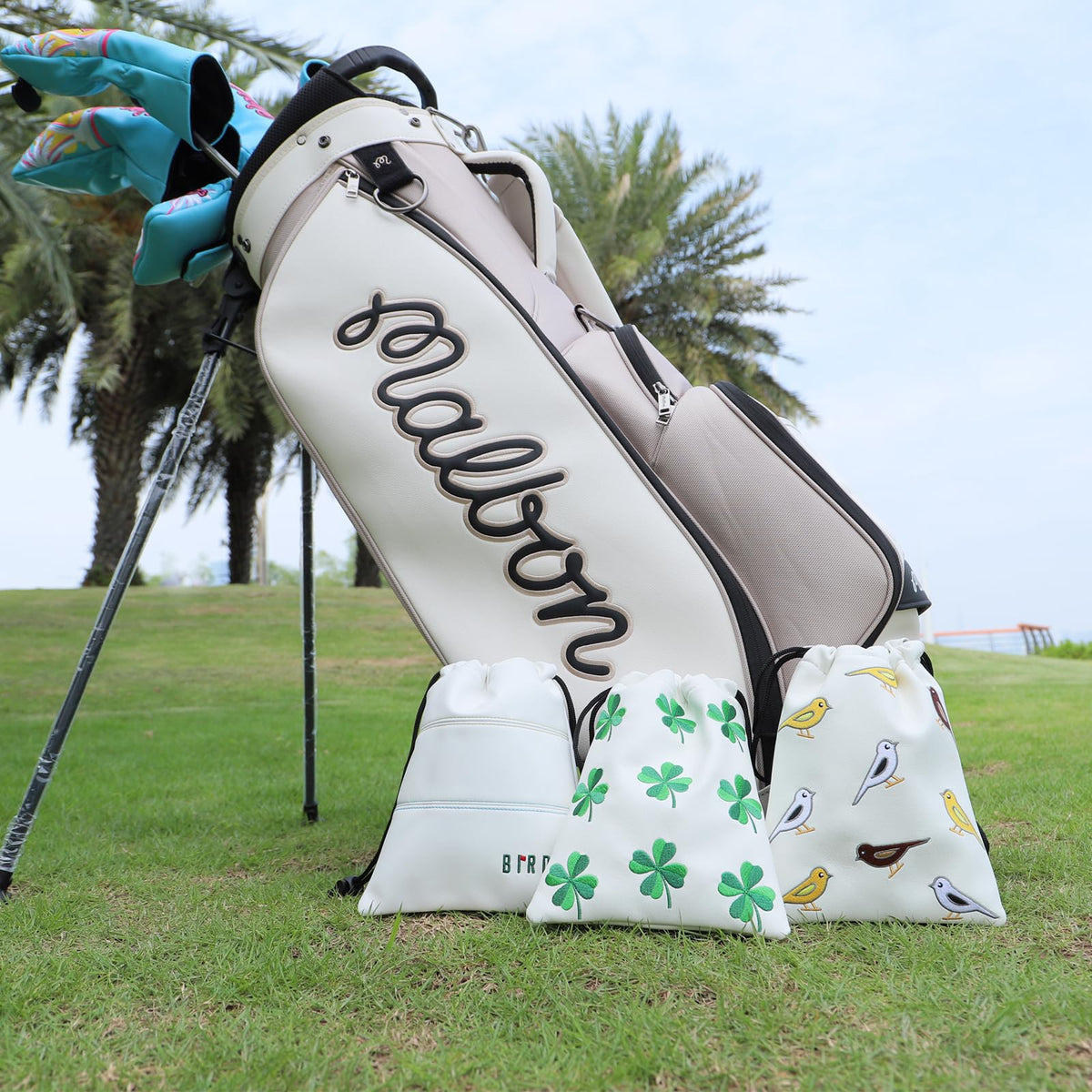 Aliennana leather golf pouch attaches to your bag for quick access.