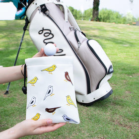 Aliennana leather golf pouch with bag attachment for quick on-bag access.