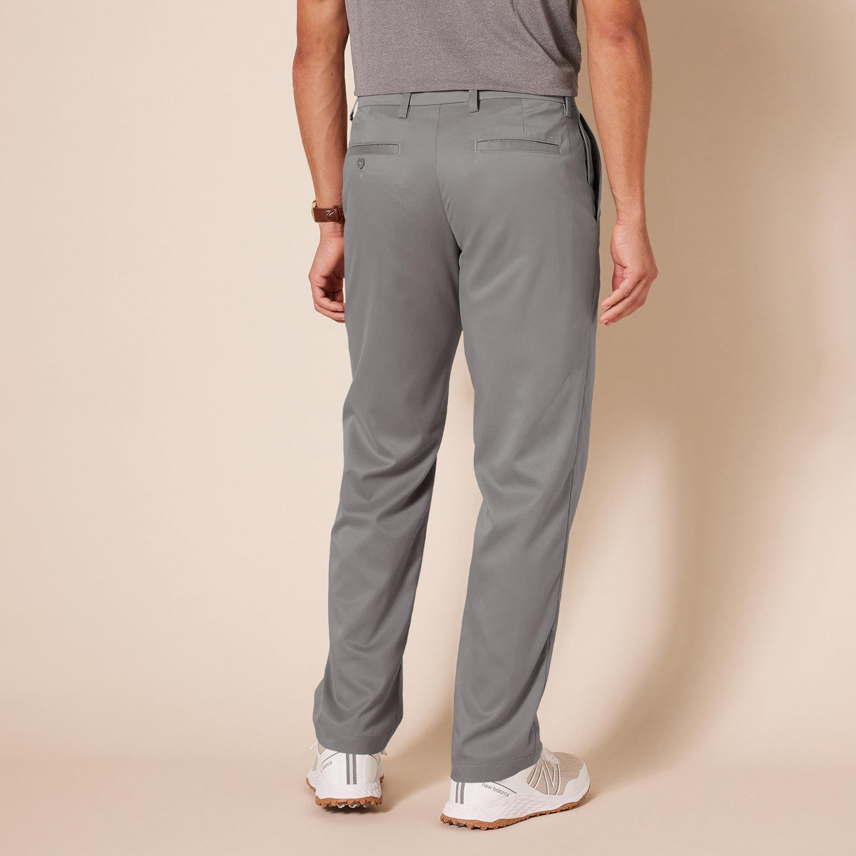 Amazon Essentials men's gray golf pant side pocket view highlighting convenient storage.
