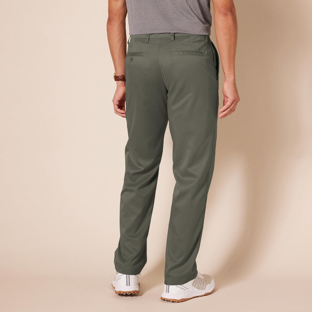 Amazon Essentials mens olive golf pant side view highlights moisture wicking and wrinkle resistant fabric