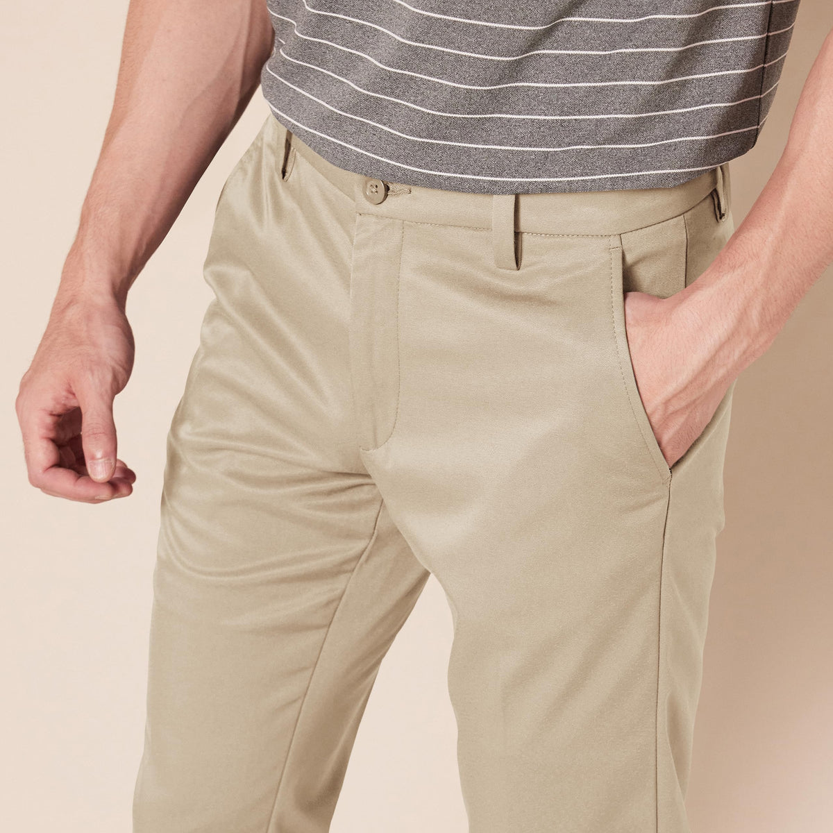 Front and back pockets on Amazon Essentials golf pants with a fifth pocket for tees.