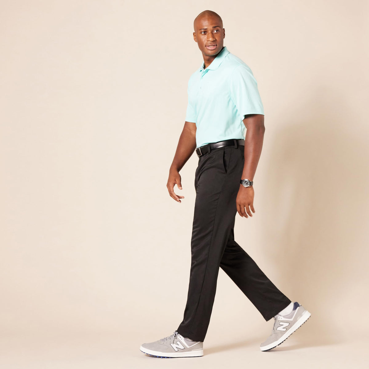 Amazon Essentials pant on course use demonstrates versatility for rounds and casual wear.