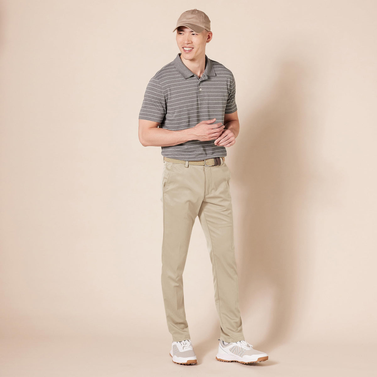 Amazon Essentials golf pant back pocket design for secure storage.