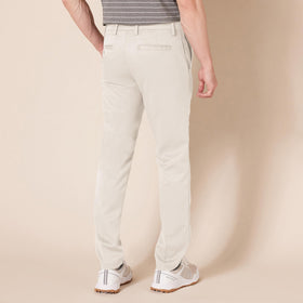 Amazon Essentials men's slim-fit stretch golf pant side view highlighting mobility.