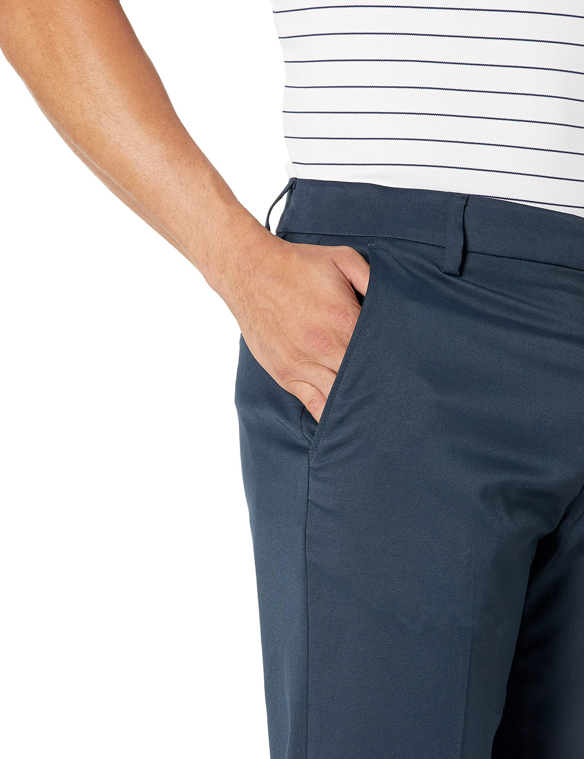 Amazon Essentials waistband detail on navy golf pants highlights shirt-tucking convenience.