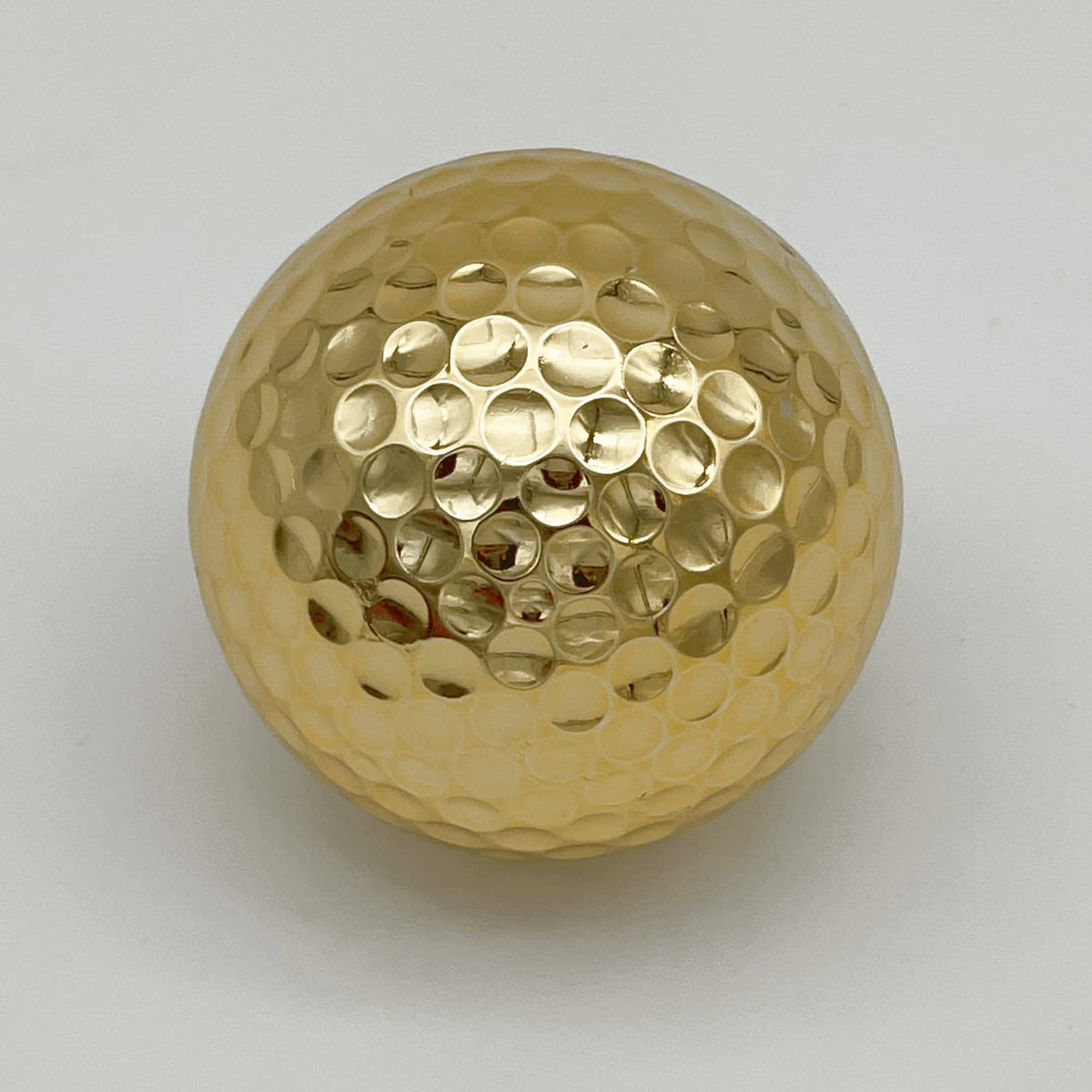 Aolowewin 3-piece golden golf ball set designed for practice.