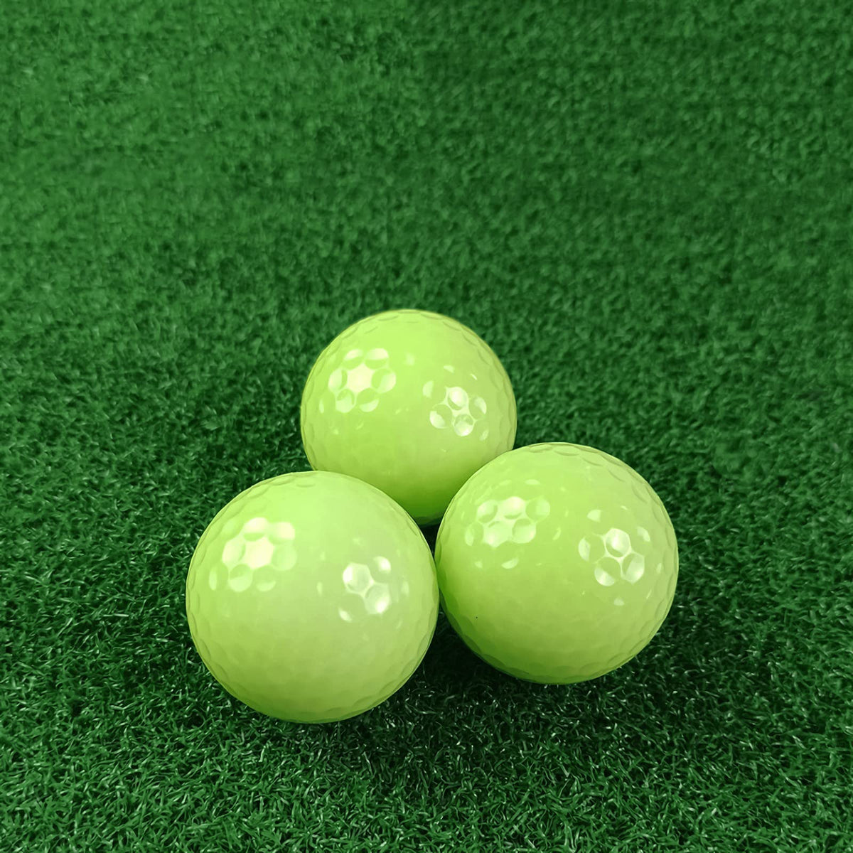 Aolowewin night golf glow ball visible in low light.