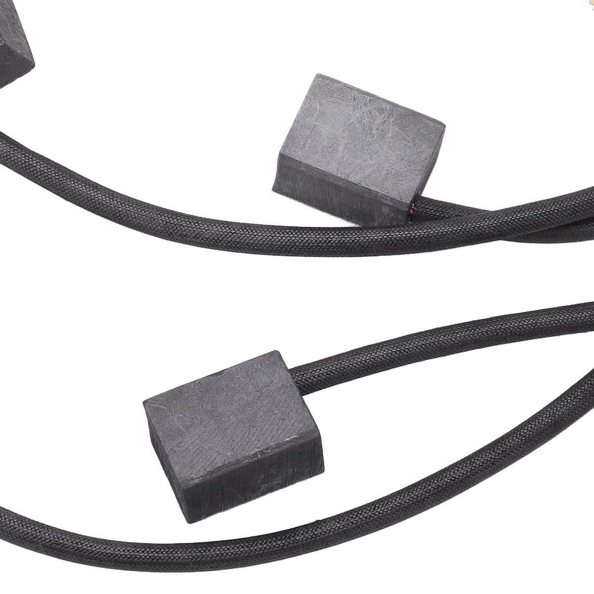Two motor brushes with hardware included in the Aramox kit.