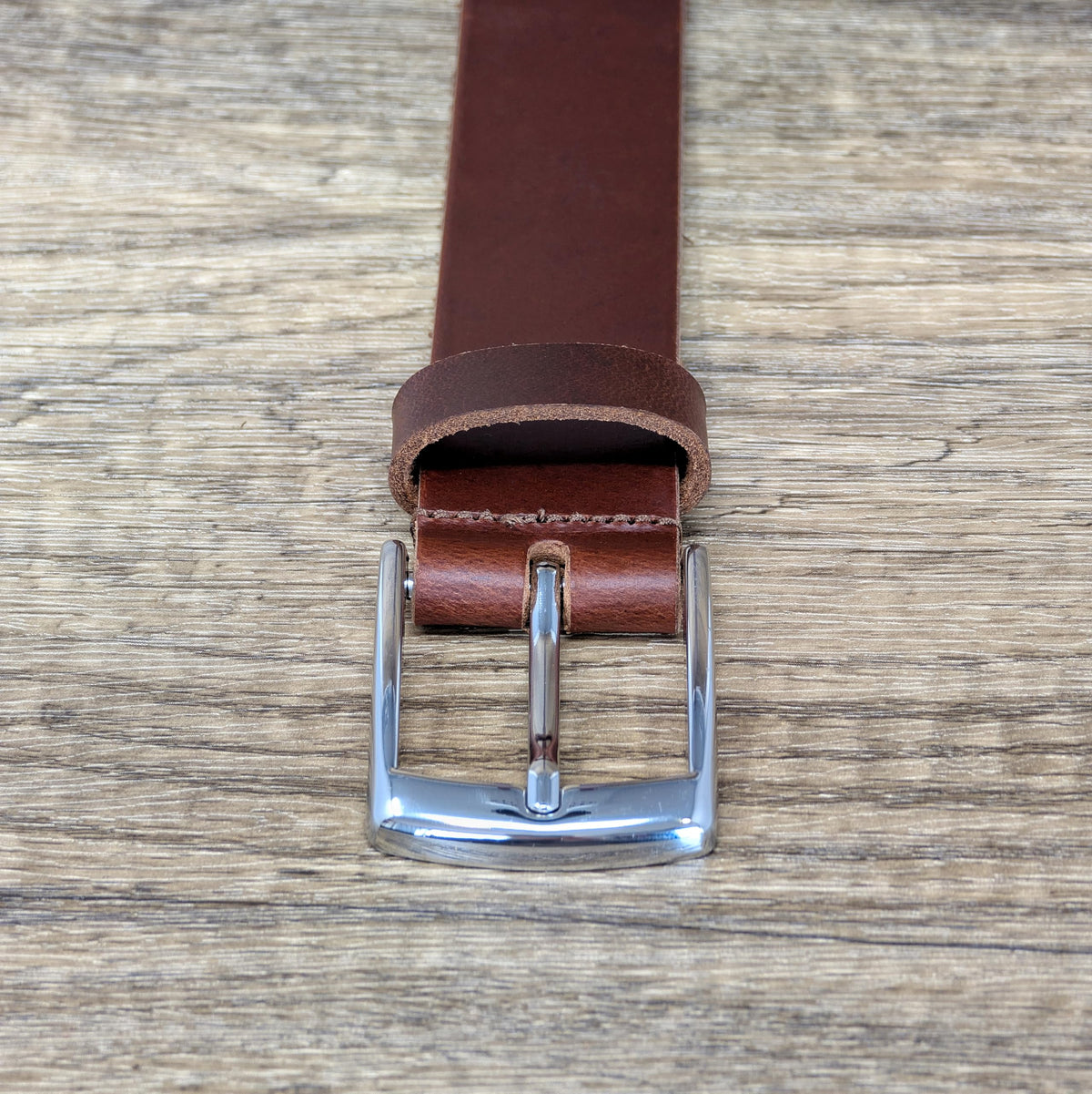 Ashford Ridge belt styled with dress and high-waisted skirt for a polished look.