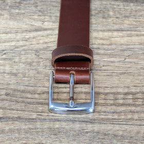 Ashford Ridge belt styled with dress and high-waisted skirt for a polished look.