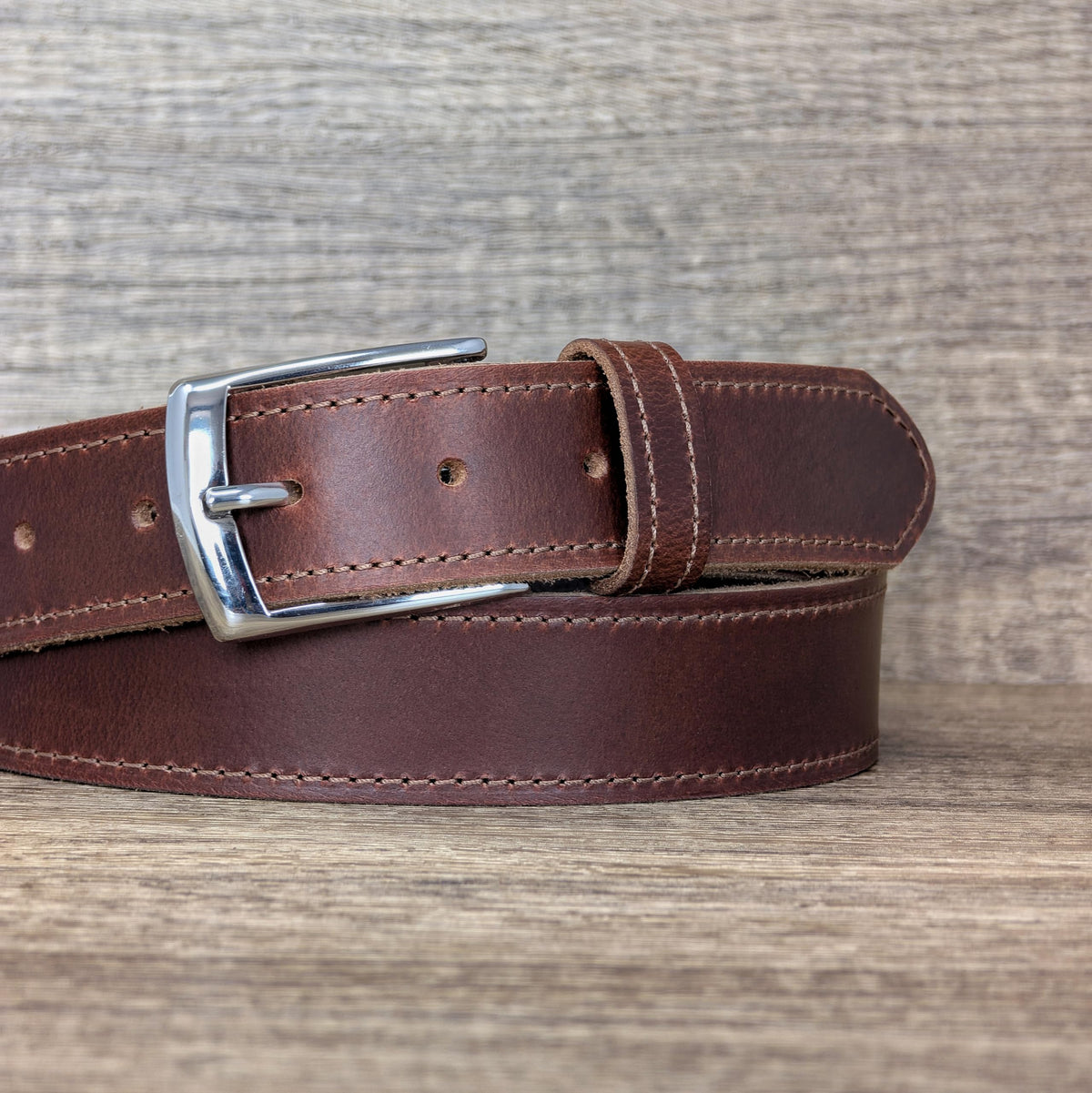 Ashford Ridge edge-stitched belt highlights durable stitching detail.