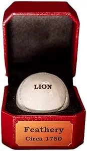 AUTHENTIC FEATHERY GOLF BALL Co Lion handmade on display, ideal as a conversation starter