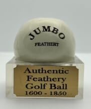AUTHENTIC FEATHERY GOLF BALL Co Lion Jumbo half-cut ball on display, a historic centerpiece.