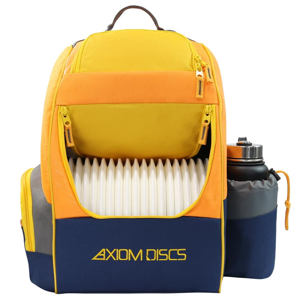 Axiom Discs Shuttle backpack in yellow ochre ready for a round of disc golf
