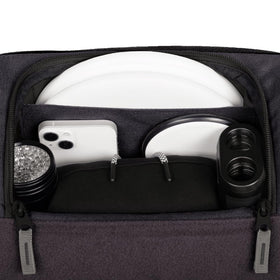 Axiom Discs Voyager Backpack chest strap with shock-absorbing webbing for stability.