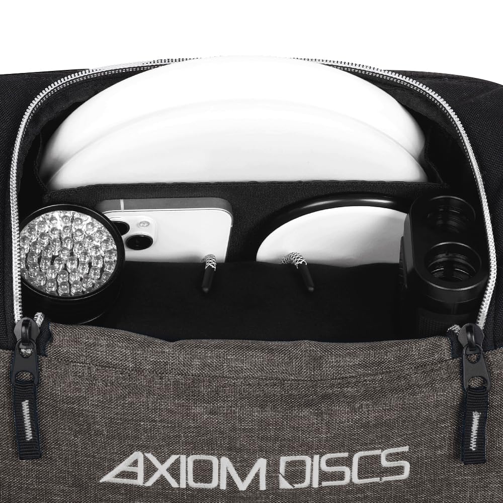 Padded shoulder straps and back panel reduce strain during long rounds