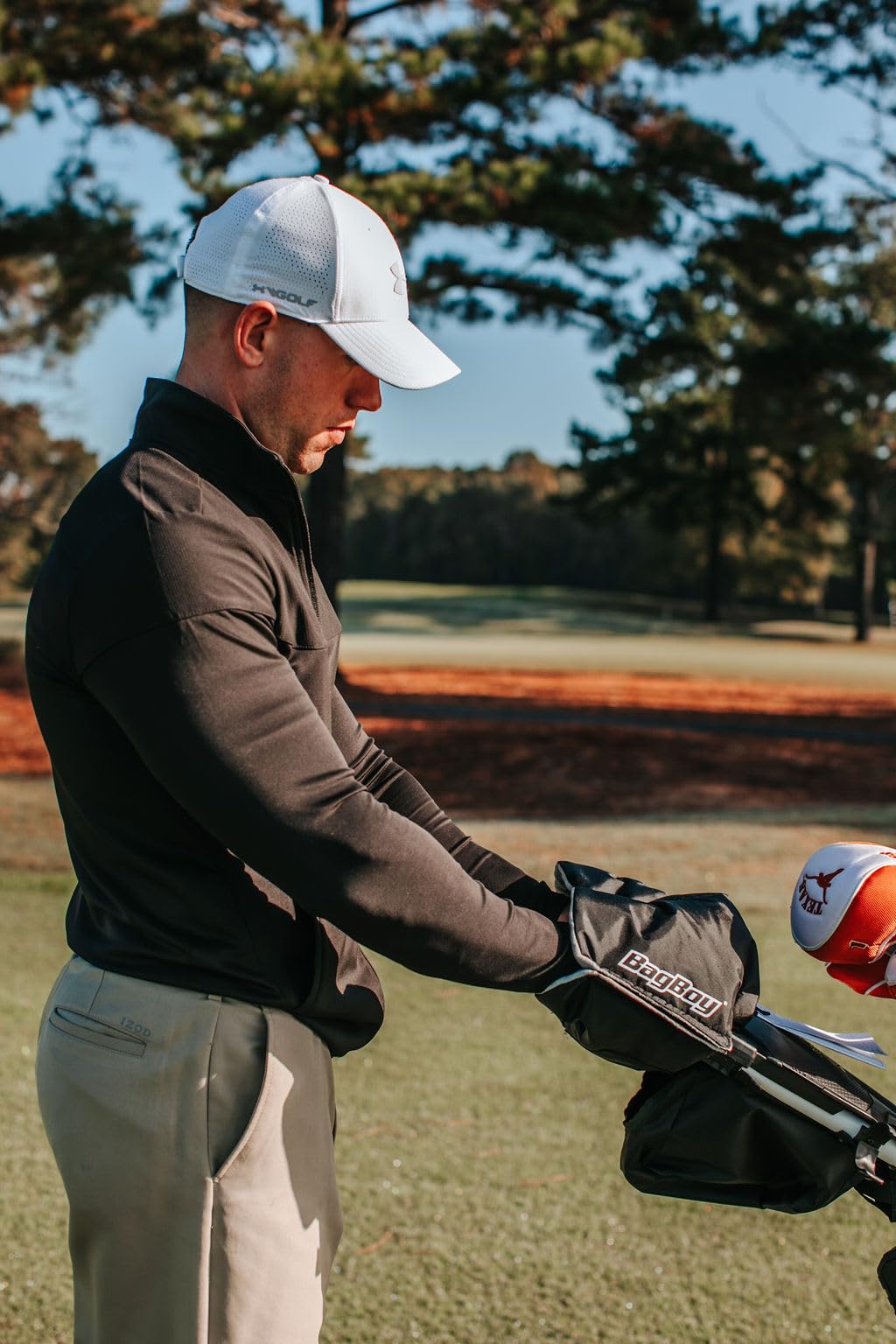Bag Boy Hand Warmer Black in use extends comfort during windy rounds