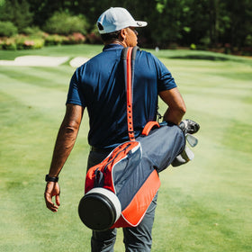 Bag Boy Loop Lite mesh pocket safely holds water bottle or Bluetooth speaker.