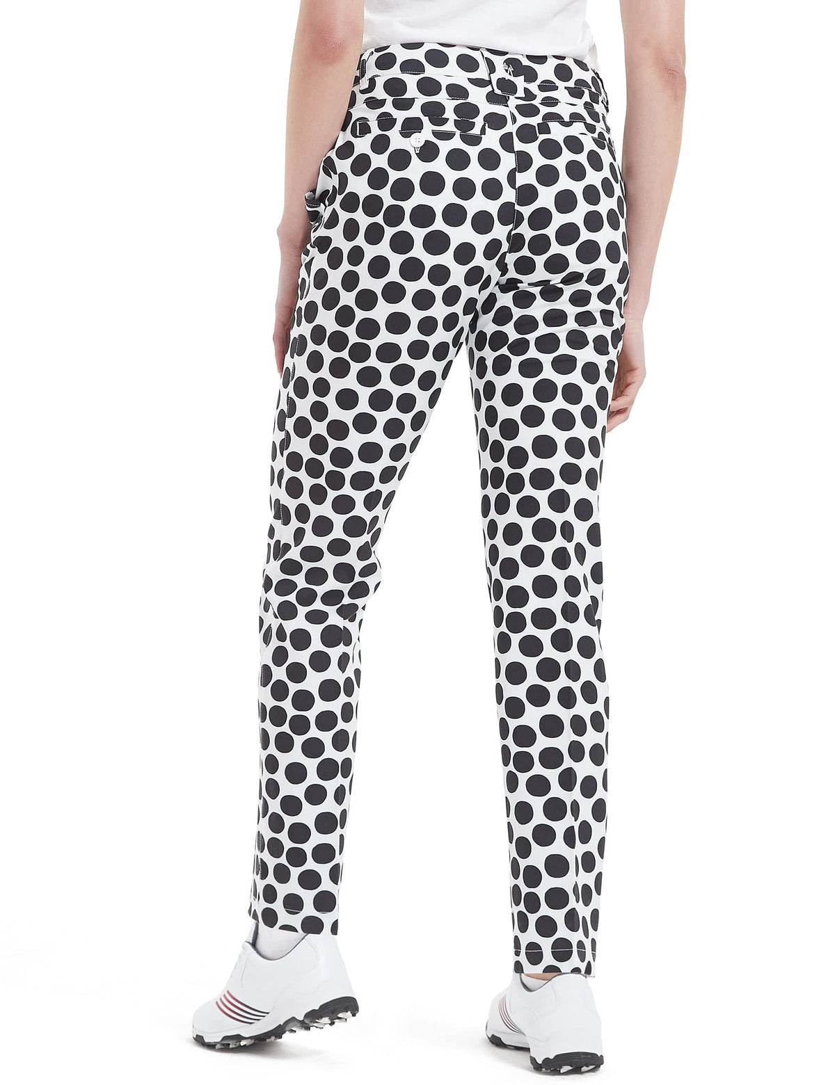Bakery women's golf pants back pockets with button closure for security.