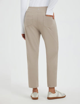 Baleaf travel pants showing moisture-wicking fabric for cool comfort during busy days.