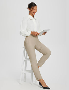 Baleaf women's khaki work pants close-up of stretchy fabric for ease of movement.