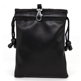 Barudan Golf compact accessory pouch attached to a golf bag on the course